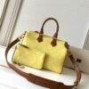 Model number M15242 - Yellow with Brown. This Speedy P9 Bandoulière 30 handbag measures 32 x 22.5 x 18 cm (length x height x width).