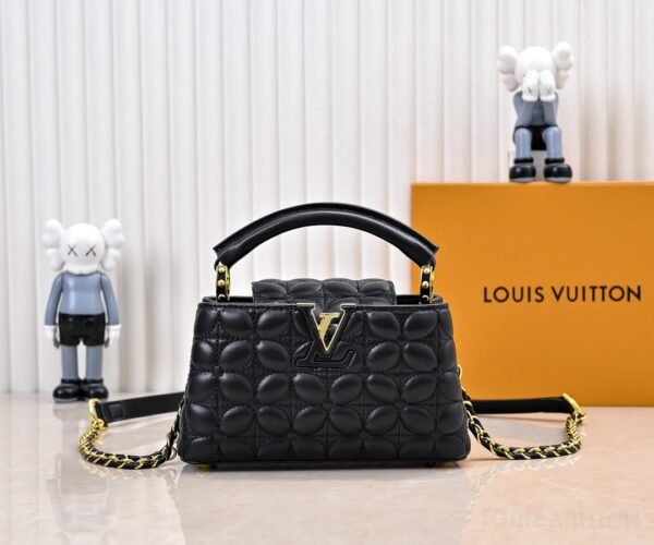 M23998 black. This Monogram embroidered floral design emerges in the elegant quilting, measuring 22 x 12 x 8 cm.