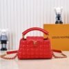 M23998 Red. This Monogram embroidered floral design emerges in the elegant quilting, adding to the Louis Vuitton store's decoration style for the Capucines mini handbag - 22 x 12 x 8 cm