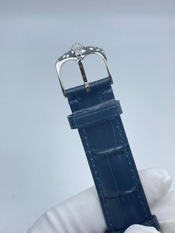 Blue dial, silver case, blue strap  39mm