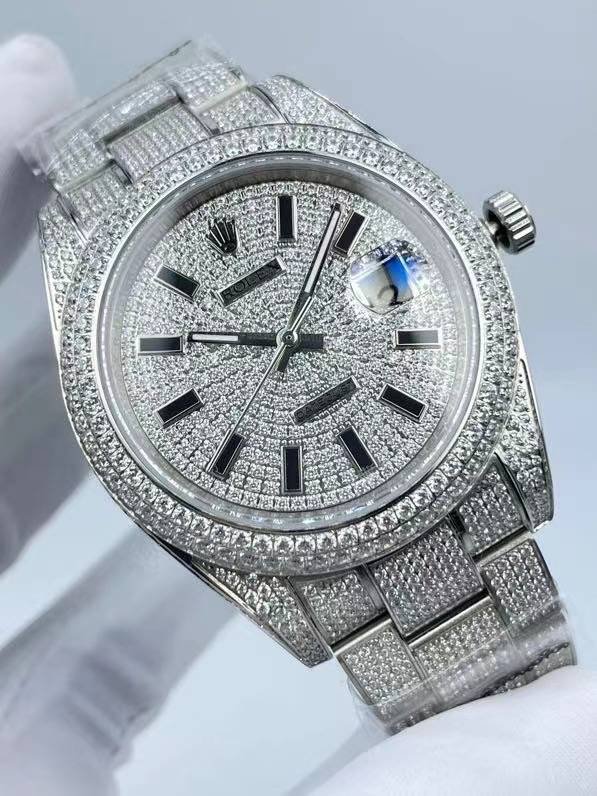 The Rolex minimalist three-stone design model is studded with diamonds and measures 41 millimeters in size.
