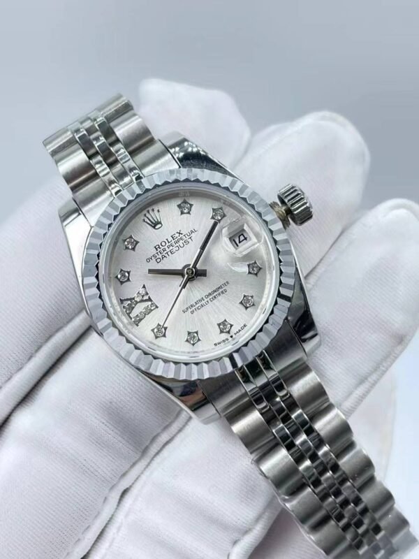 Rolex women's model with beaded star-shaped diamonds, size 26mm