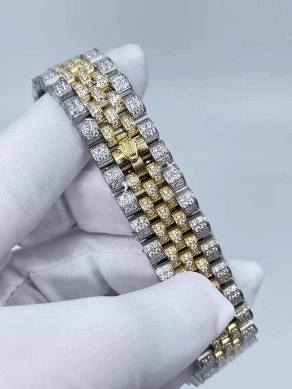 Rolex's new full-diamond large-diameter bezel, with colorful Arabic numerals in a starburst pattern, measures 43mm.