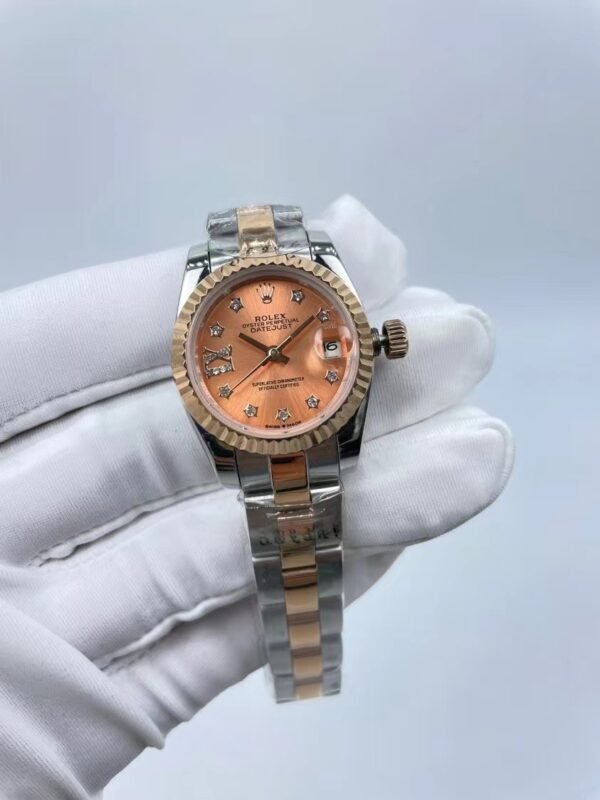 Rolex women's model with beaded star-shaped diamonds, size 26mm