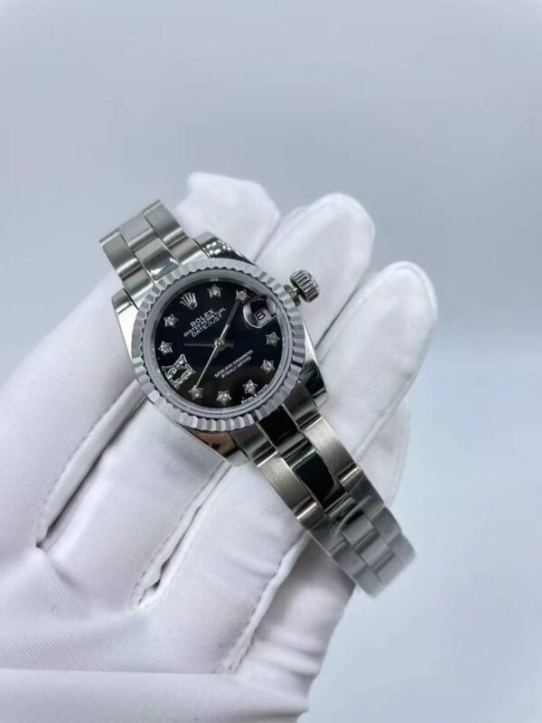 Rolex women's model with beaded star-shaped diamonds, size 26mm