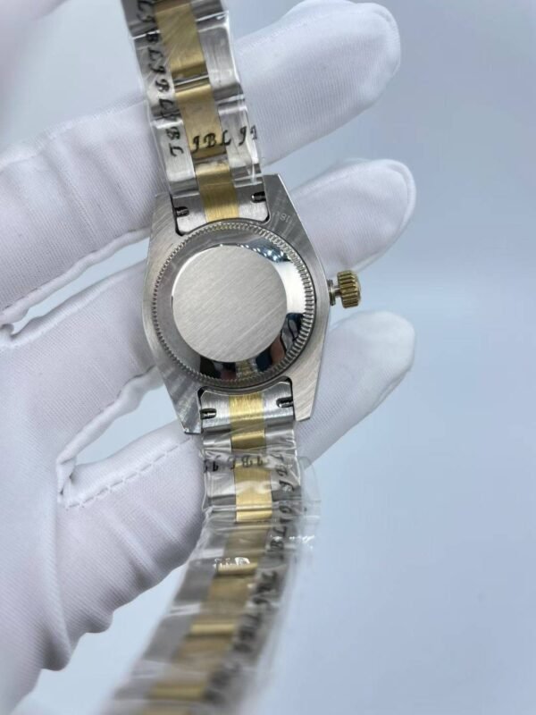 Rolex women's model with beaded bezel and Roman numerals, size 26mm