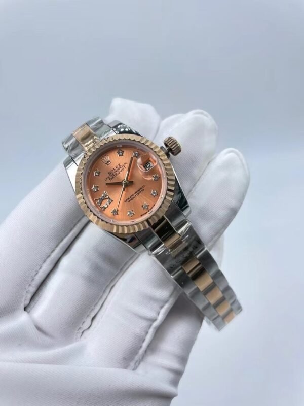 Rolex women's model with beaded star-shaped diamonds, size 26mm