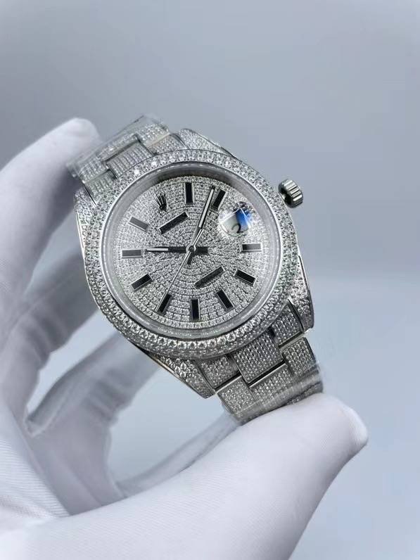 The Rolex minimalist three-stone design model is studded with diamonds and measures 41 millimeters in size.