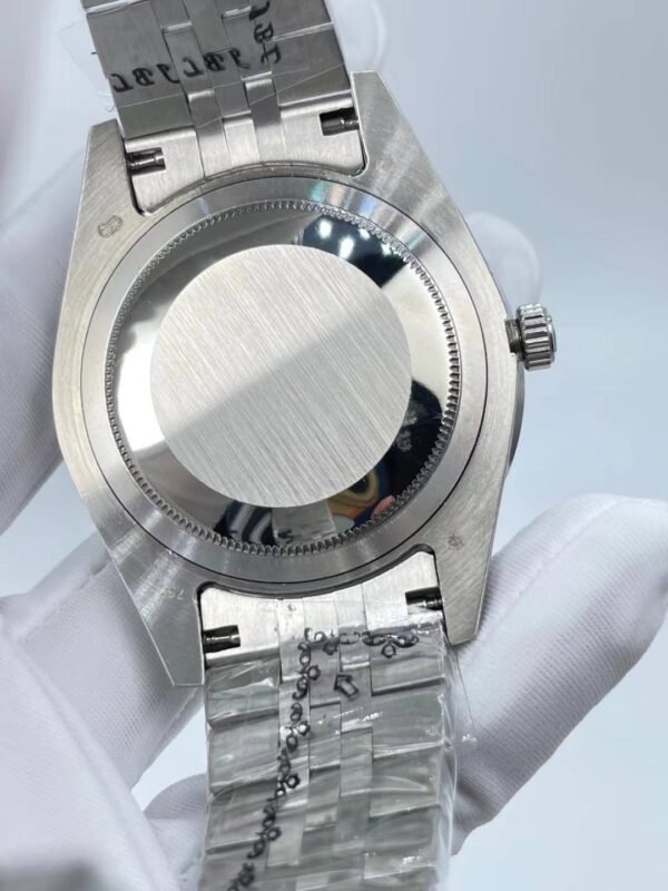 Rolex's new full-diamond large-diameter bezel, with colorful Arabic numerals in a starburst pattern, measures 43mm.