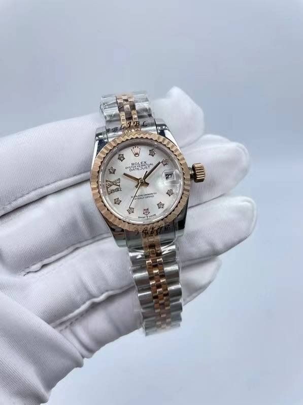 Rolex women's model with beaded star-shaped diamonds, size 26mm