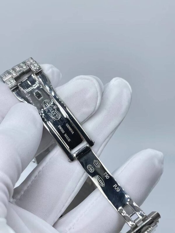 Rolex's new full-diamond large-diameter bezel, with colorful Arabic numerals in a starburst pattern, measures 43mm.