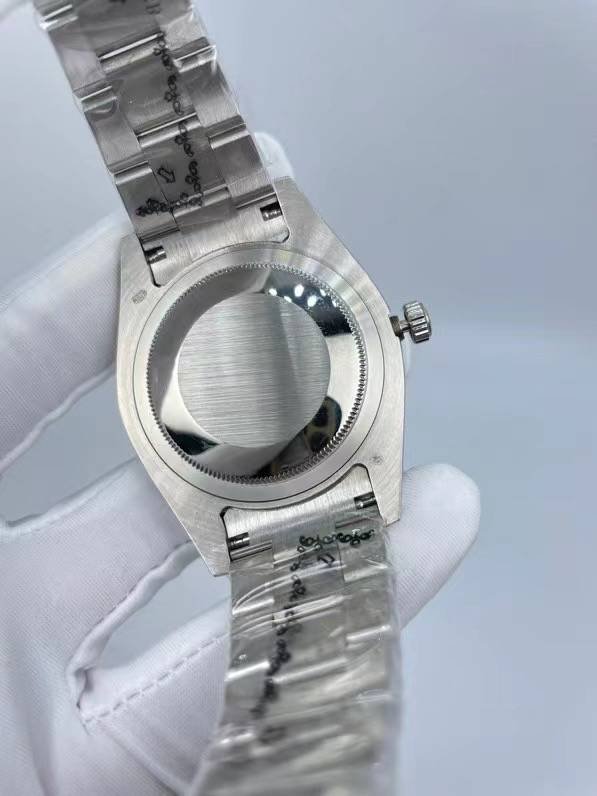 The Rolex minimalist three-stone design model is studded with diamonds and measures 41 millimeters in size.