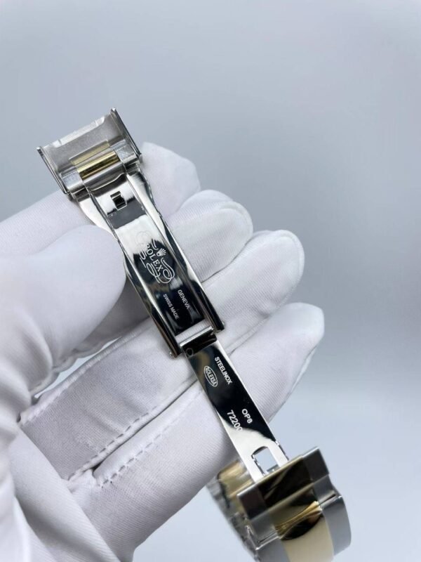 The new Rolex SUB model with a sapphire crystal face, size 40mm. The new strap design: diamonds on both sides + shiny center.