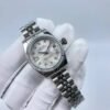 Rolex women's model with beaded star-shaped diamonds, size 26mm