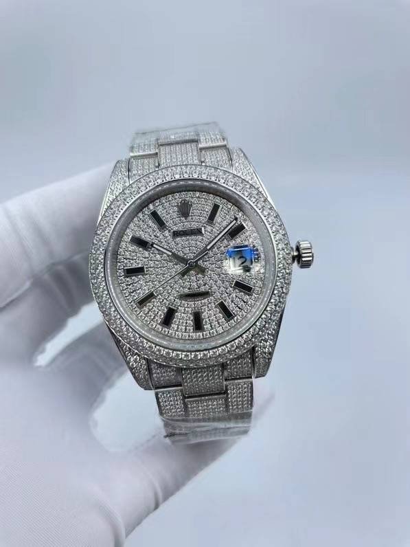 The Rolex minimalist three-stone design model is studded with diamonds and measures 41 millimeters in size.