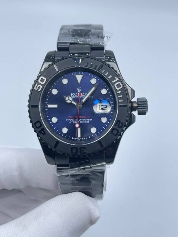 New YM features a black casing paired with a blue dial.  40mm