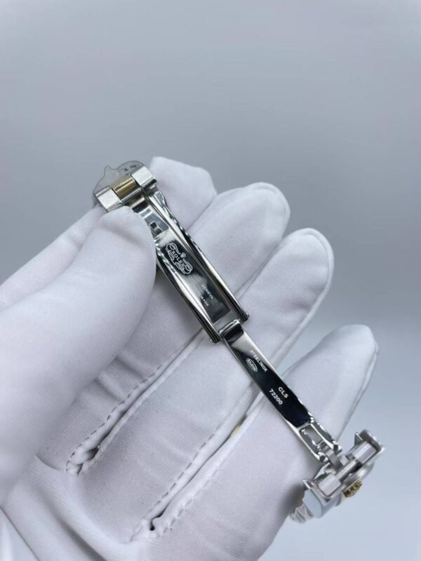 Rolex women's model with beaded bezel and Roman numerals, size 26mm