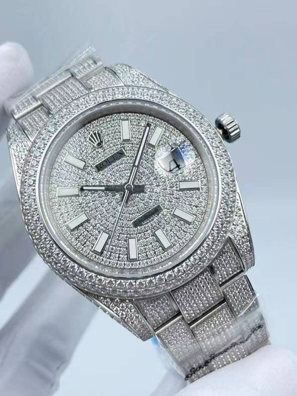 The Rolex minimalist three-stone design model is studded with diamonds and measures 41 millimeters in size.