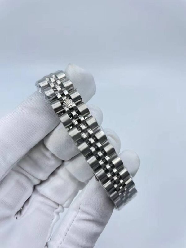 Rolex women's model with beaded star-shaped diamonds, size 26mm