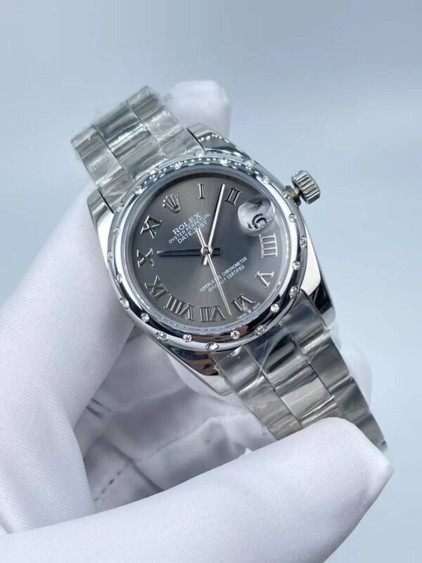 New model with silver toothed and Roman finish, size 31mm