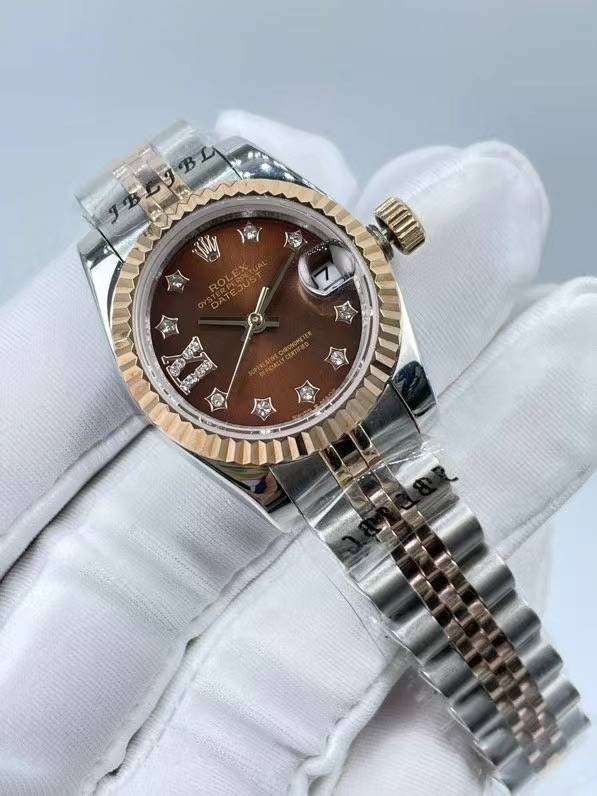 Rolex women's model with beaded star-shaped diamonds, size 26mm
