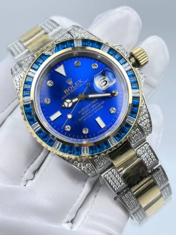The new Rolex SUB model with a sapphire crystal face, size 40mm. The new strap design: diamonds on both sides + shiny center.