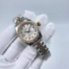 Rolex women's model with beaded star-shaped diamonds, size 26mm