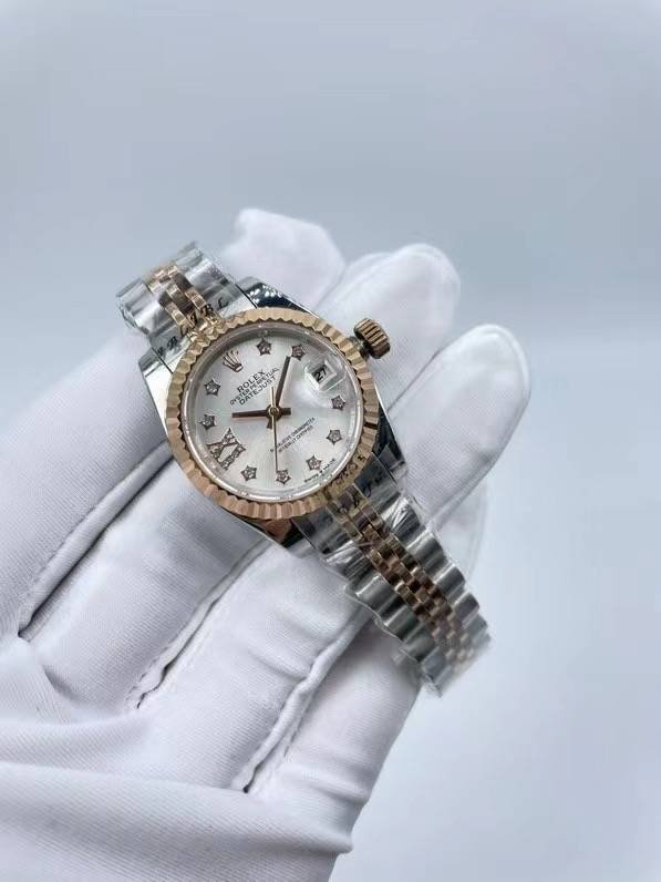 Rolex women's model with beaded star-shaped diamonds, size 26mm