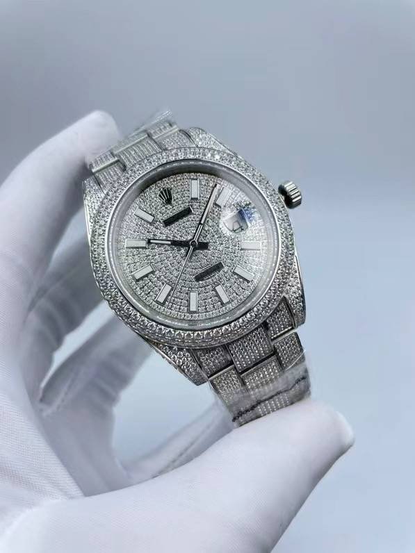 The Rolex minimalist three-stone design model is studded with diamonds and measures 41 millimeters in size.