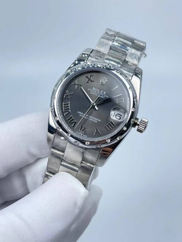 New model with silver toothed and Roman finish, size 31mm