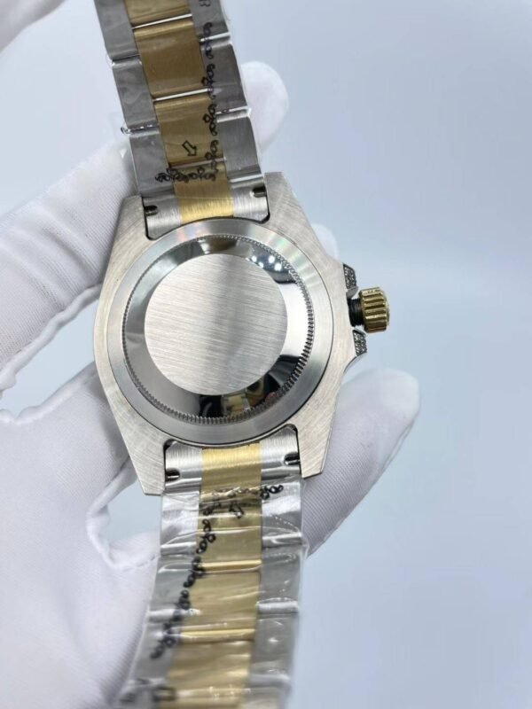 The new Rolex SUB model with a sapphire crystal face, size 40mm. The new strap design: diamonds on both sides + shiny center.