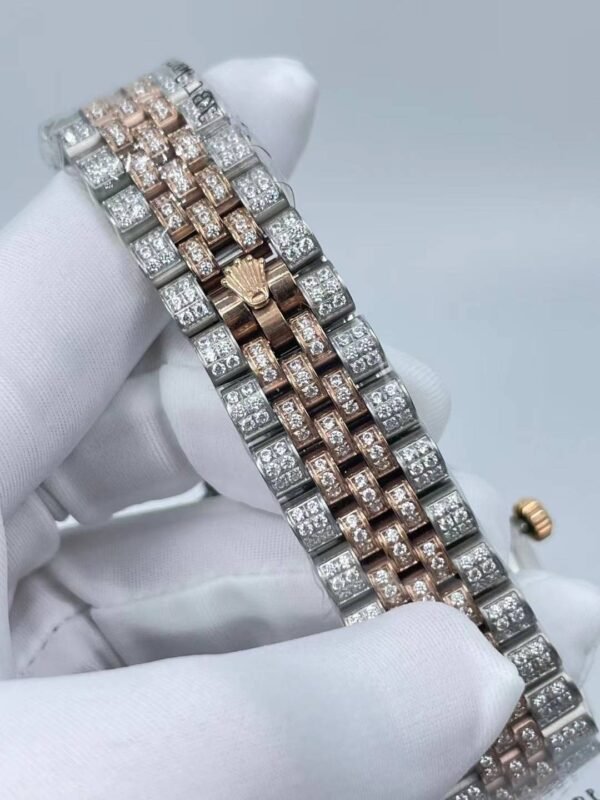 Rolex's new full-diamond large-diameter bezel, with colorful Arabic numerals in a starburst pattern, measures 43mm.