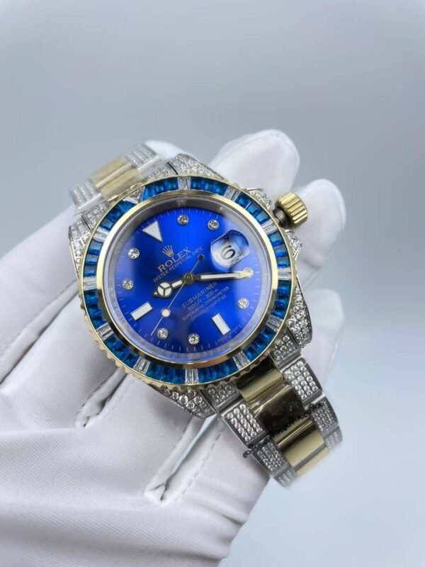 The new Rolex SUB model with a sapphire crystal face, size 40mm. The new strap design: diamonds on both sides + shiny center.