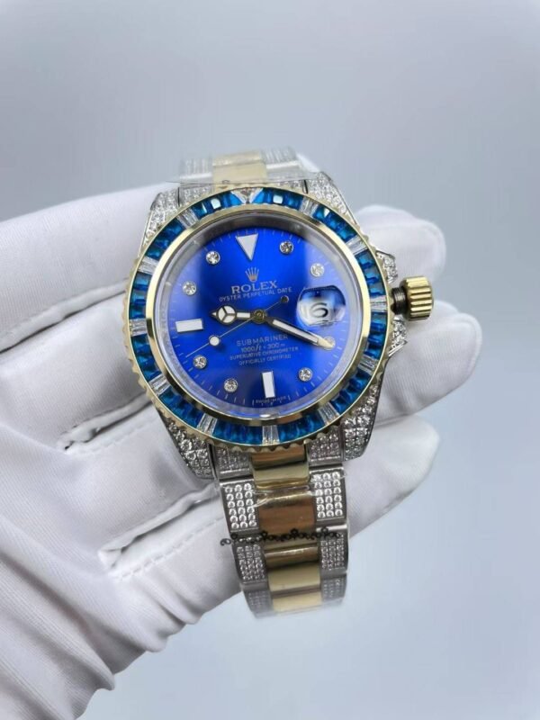 The new Rolex SUB model with a sapphire crystal face, size 40mm. The new strap design: diamonds on both sides + shiny center.