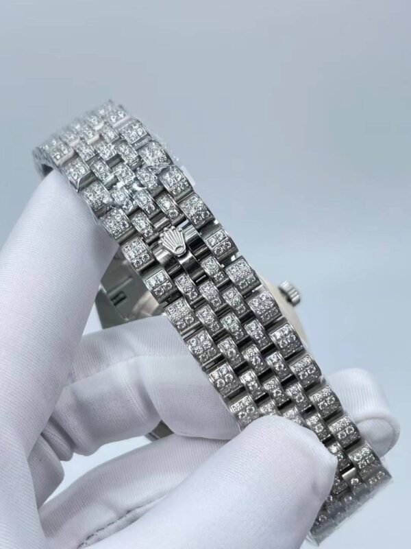 Rolex's new full-diamond large-diameter bezel, with colorful Arabic numerals in a starburst pattern, measures 43mm.