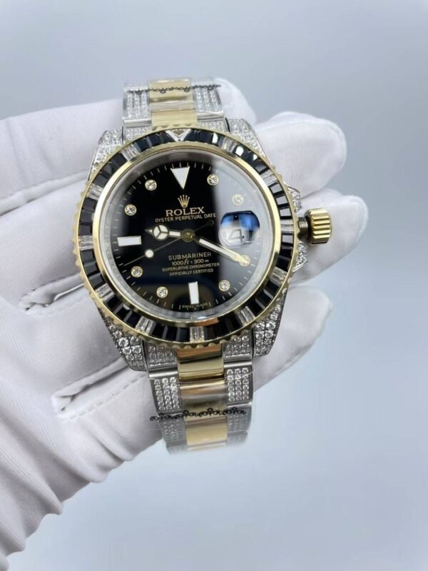 The new Rolex SUB model with a sapphire crystal face, size 40mm. The new strap design: diamonds on both sides + shiny center.