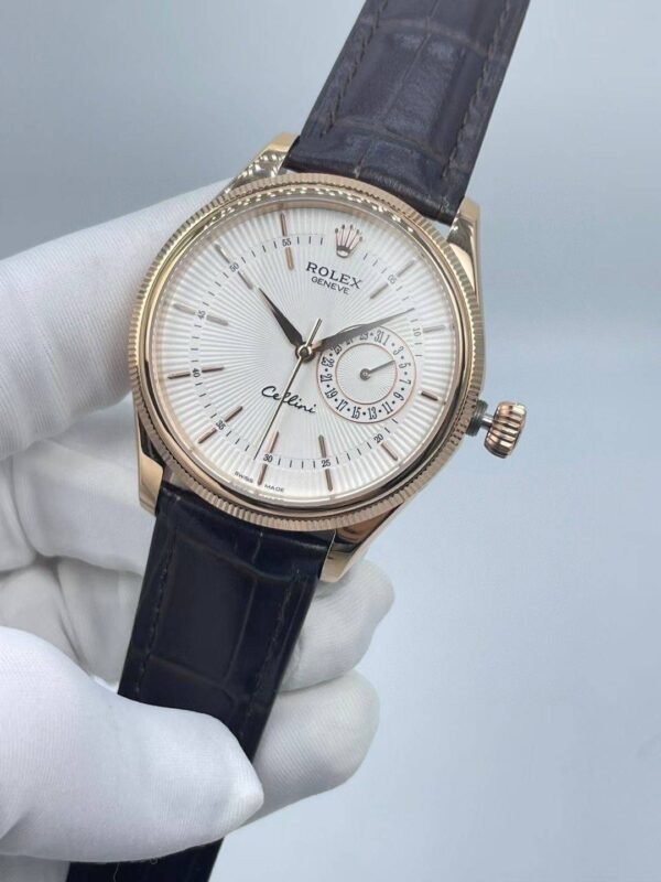 Silver dial, rose gold case  39mm