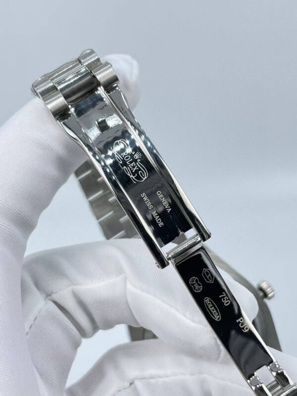 New Rolex model with Arabic numerals and Sunday calendar,  41mm