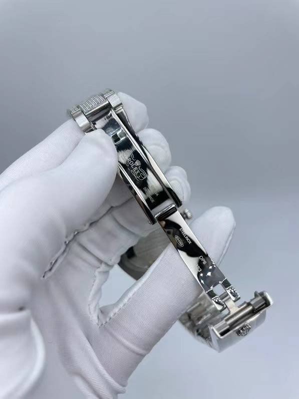 The Rolex minimalist three-stone design model is studded with diamonds and measures 41 millimeters in size.