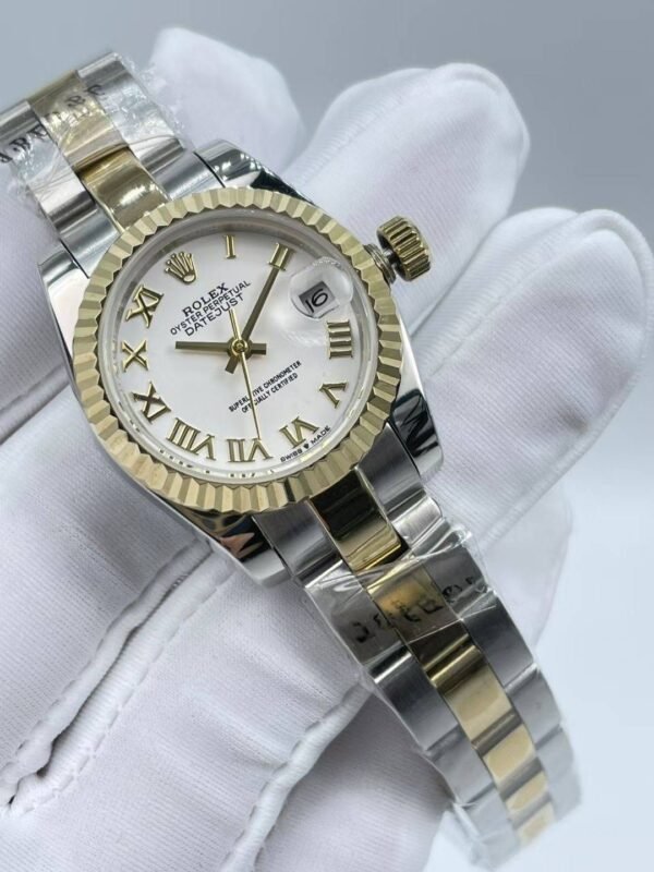 Rolex women's model with beaded bezel and Roman numerals, size 26mm