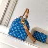 Model number M14074 - Blue color. This Speedy P9 Bandoulière 30 handbag measures 32 x 22.5 x 18 centimeters (length x height x width).