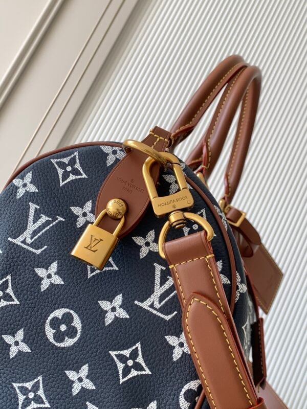 Model number M15282 - Blue fabric Speedy P9 Bandoulière 30 handbag          32 x 22.5 x 18 cm (length x height x width)