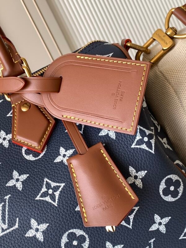 Model number M15282 - Blue fabric Speedy P9 Bandoulière 30 handbag          32 x 22.5 x 18 cm (length x height x width)