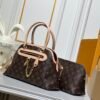 Small size M15208 M25774 This Louis Vuitton Ever More PM handbag measures 28x18x12 cm.