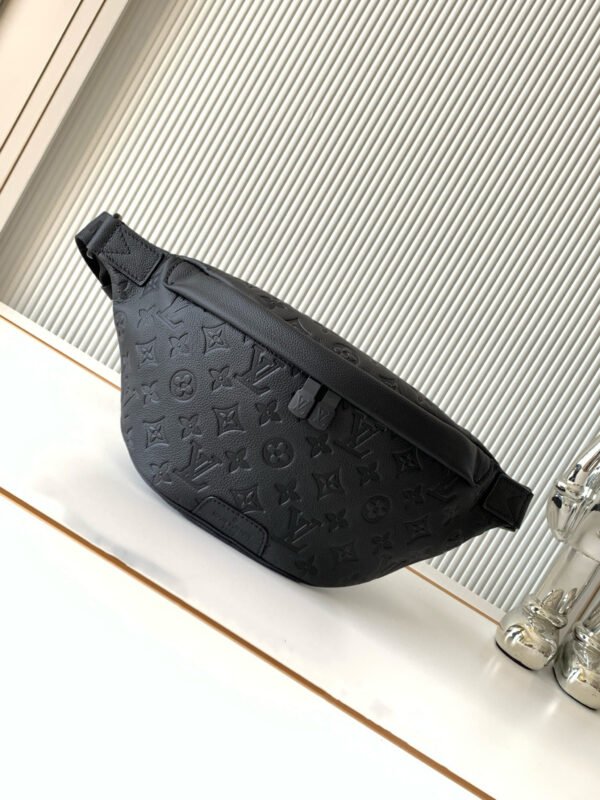 Model No. M46036 - Black Embossed Design. This Discovery waist bag is made of soft Monogram Shadow embossed cowhide leather. Dimensions: 44 x 15 x 9 cm (length x height x width)