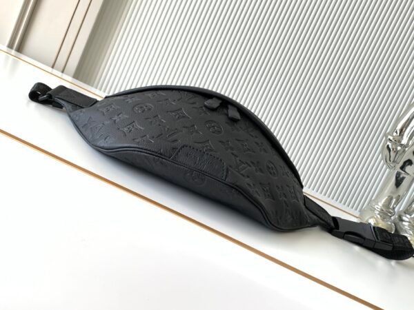 Model No. M46036 - Black Embossed Design. This Discovery waist bag is made of soft Monogram Shadow embossed cowhide leather. Dimensions: 44 x 15 x 9 cm (length x height x width)