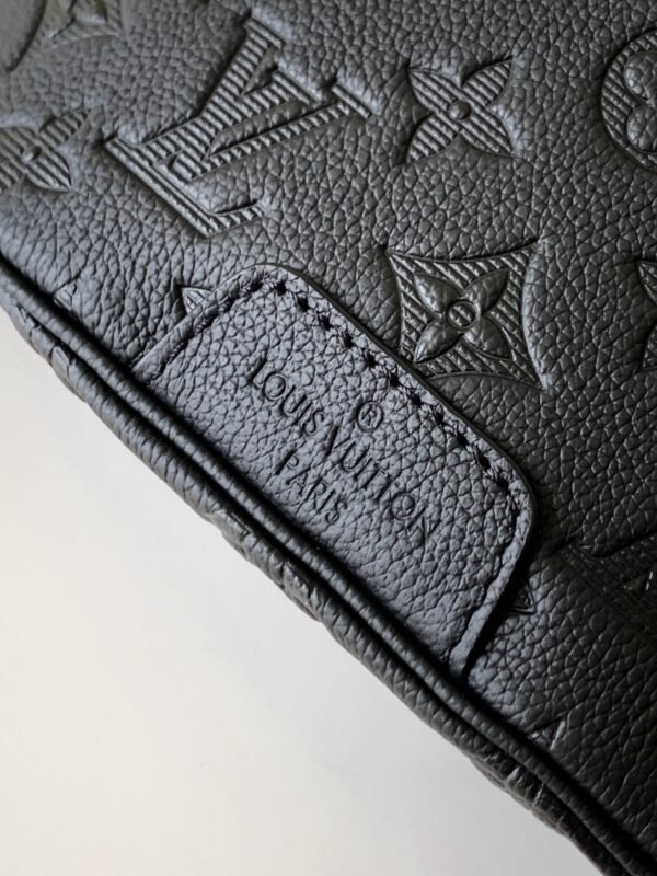 Model No. M46036 - Black Embossed Design. This Discovery waist bag is made of soft Monogram Shadow embossed cowhide leather. Dimensions: 44 x 15 x 9 cm (length x height x width)