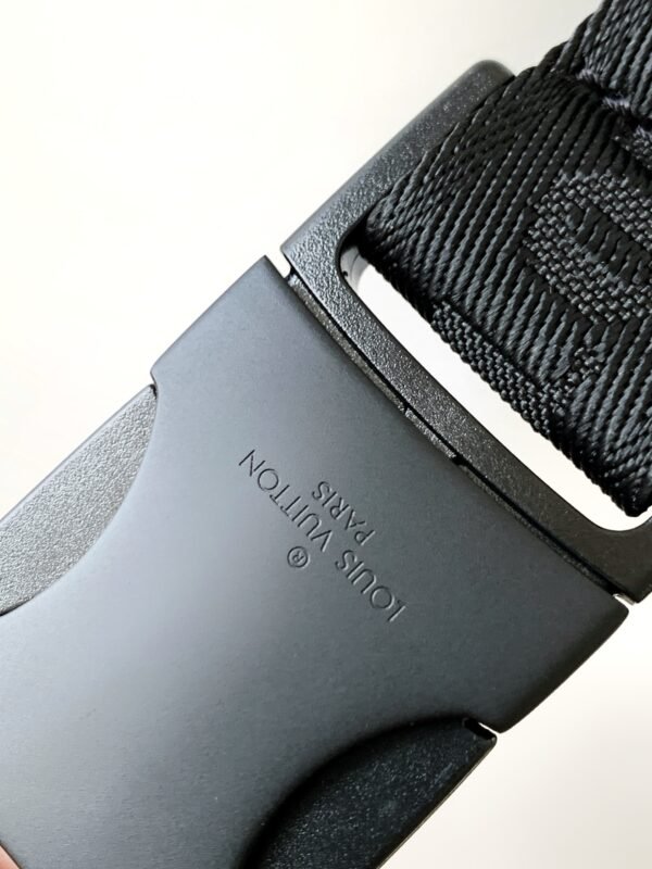 Model No. M46036 - Black Embossed Design. This Discovery waist bag is made of soft Monogram Shadow embossed cowhide leather. Dimensions: 44 x 15 x 9 cm (length x height x width)