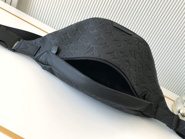 Model No. M46036 - Black Embossed Design. This Discovery waist bag is made of soft Monogram Shadow embossed cowhide leather. Dimensions: 44 x 15 x 9 cm (length x height x width)