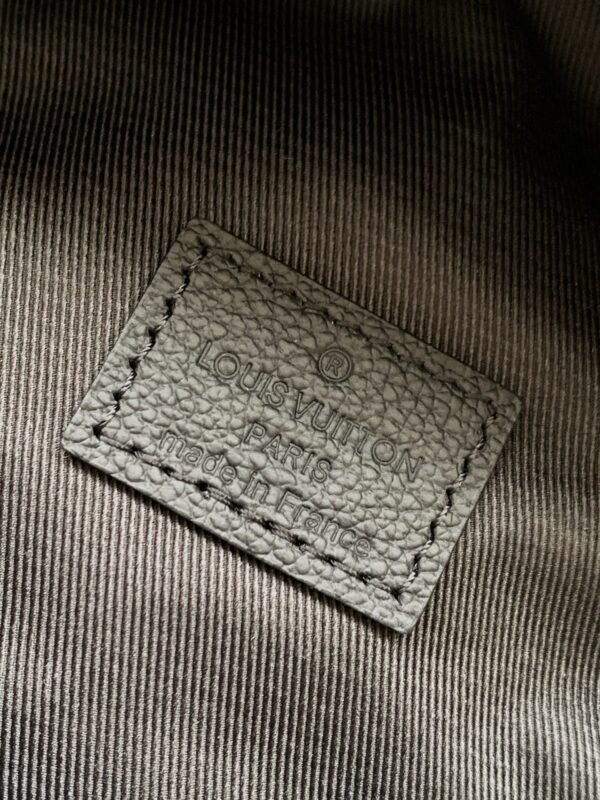 Model No. M46036 - Black Embossed Design. This Discovery waist bag is made of soft Monogram Shadow embossed cowhide leather. Dimensions: 44 x 15 x 9 cm (length x height x width)